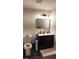 Modern bathroom with updated vanity and toilet at 3619 Elinburg Ne Ct, Buford, GA 30519