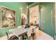 Spacious dining room area with an open floor plan and hardwood flooring at 3619 Elinburg Ne Ct, Buford, GA 30519