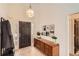 Bright foyer with hardwood floors, high ceilings, and stylish decor with access to multiple rooms at 3619 Elinburg Ne Ct, Buford, GA 30519