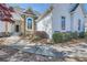 Inviting walkway leading to the entrance, showcasing the exterior architectural details and landscaping at 3619 Elinburg Ne Ct, Buford, GA 30519