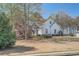 Lovely single-Gathering home with stone accents and mature trees at 3619 Elinburg Ne Ct, Buford, GA 30519