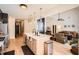 Open concept kitchen with a large island, stainless steel appliances, and hardwood floors at 3619 Elinburg Ne Ct, Buford, GA 30519