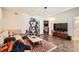 Relaxing living room with a comfortable sofa, tv, coffee table and decor at 3619 Elinburg Ne Ct, Buford, GA 30519