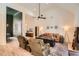 Spacious living room featuring a vaulted ceiling and hardwood floors open to dining room and kitchen at 3619 Elinburg Ne Ct, Buford, GA 30519