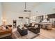 Bright and open living room with high ceilings and hardwood floors at 3619 Elinburg Ne Ct, Buford, GA 30519