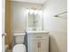 Bathroom with a white vanity, updated fixtures and lighting, and decorative tile in the shower at 620 Peachtree Ne St # 1413, Atlanta, GA 30308