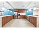 Spacious kitchen with stainless steel appliances, ample counter space, and unique hexagon tile flooring at 620 Peachtree Ne St # 1413, Atlanta, GA 30308