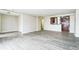 Bright living room featuring wood floors and an open concept to the kitchen at 620 Peachtree Ne St # 1413, Atlanta, GA 30308