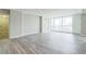 Living room showcasing balcony with city views, modern floor, and neutral tones at 620 Peachtree Ne St # 1413, Atlanta, GA 30308