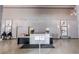 Elegant lobby featuring artwork, modern lighting, a reception desk, and seating for guests at 620 Peachtree Ne St # 1413, Atlanta, GA 30308