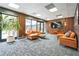 Lobby area featuring contemporary furniture, a large window, and stylish decor at 620 Peachtree Ne St # 1413, Atlanta, GA 30308