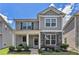 Charming two-story home with stone accents and well-maintained landscaping at 847 Venture Sw Way, Atlanta, GA 30331