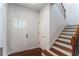 Bright foyer with hardwood floors and staircase at 847 Venture Sw Way, Atlanta, GA 30331