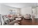 Inviting living room upstairs featuring hardwood floors and neutral tones, creating a warm and relaxing atmosphere at 847 Venture Sw Way, Atlanta, GA 30331