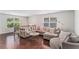 Cozy living room with hardwood floors and comfortable seating, perfect for relaxation at 847 Venture Sw Way, Atlanta, GA 30331
