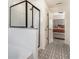 Contemporary main bathroom with glass shower and stylish patterned tile flooring at 847 Venture Sw Way, Atlanta, GA 30331