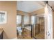 The bathroom features a tiled shower, tub, and vanity with granite countertop at 1137 Fortress Sw Ave, Atlanta, GA 30315