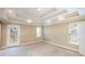 Spacious bedroom with tray ceiling, carpeted floor, and windows that provide plenty of natural light at 1137 Fortress Sw Ave, Atlanta, GA 30315