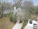 Charming two-story home with landscaped yard, driveway and well-maintained lawn at 1137 Fortress Sw Ave, Atlanta, GA 30315