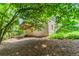 Backyard featuring a well-maintained lawn and the rear of the two-story home at 2205 Parliament Dr, Lawrenceville, GA 30043