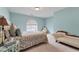 Bedroom with an accent window and chaise lounge at 2205 Parliament Dr, Lawrenceville, GA 30043