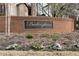 Brick entrance sign for Buckingham community with manicured landscaping at 2205 Parliament Dr, Lawrenceville, GA 30043