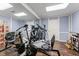 Home gym with exercise equipment and hardwood floors at 2205 Parliament Dr, Lawrenceville, GA 30043