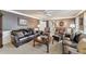 Spacious living room with a comfortable seating arrangement, coffee table, and neutral carpet at 2205 Parliament Dr, Lawrenceville, GA 30043