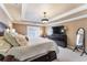 Spacious main bedroom with a large bed, dresser, and a view from the window at 2205 Parliament Dr, Lawrenceville, GA 30043