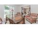 Cozy home office with a large desk, comfortable chairs, and natural light at 2205 Parliament Dr, Lawrenceville, GA 30043