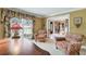 Well lit office space with large windows, a desk, and armchairs at 2205 Parliament Dr, Lawrenceville, GA 30043