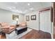 Finished basement with a sitting area, hardwood floors, and recessed lighting at 2205 Parliament Dr, Lawrenceville, GA 30043