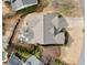 Aerial view of the house showing the roof, driveway, backyard, and nearby landscaping at 2692 Glenrose Hl, Atlanta, GA 30341