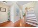 Open entryway with hardwood floors, staircase, and natural light, creating a welcoming atmosphere at 2692 Glenrose Hl, Atlanta, GA 30341