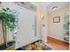 Bright entryway featuring a white front door, hardwood floors, and decorative accents at 2692 Glenrose Hl, Atlanta, GA 30341