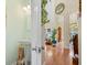 Hallway leading to living areas, features hardwood floors, half bath and natural light at 2692 Glenrose Hl, Atlanta, GA 30341