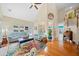 Spacious living room with vaulted ceilings, hardwood floors, and ample natural light at 2692 Glenrose Hl, Atlanta, GA 30341