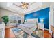 Spacious main bedroom with trey ceiling, a blue accent wall, and lots of natural light at 2692 Glenrose Hl, Atlanta, GA 30341