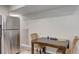 Kitchen featuring a stainless steel refrigerator and a table for dining at 4090 Mark Todd Ct, Hoschton, GA 30548