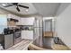 Kitchen featuring stainless steel appliances, white cabinetry, and a table for dining at 4090 Mark Todd Ct, Hoschton, GA 30548