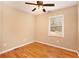 Bedroom features hardwood floors and natural light at 1736 Inas Way, Tucker, GA 30084