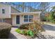 Split-level home featuring a well-maintained front yard and driveway at 1736 Inas Way, Tucker, GA 30084