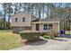 Split-level home featuring a well-maintained front yard and driveway at 1736 Inas Way, Tucker, GA 30084