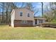 Split-level home featuring a well-maintained front yard and driveway at 1736 Inas Way, Tucker, GA 30084