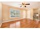 Bright living room with hardwood floors and large window at 1736 Inas Way, Tucker, GA 30084