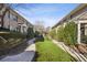 Beautifully landscaped community featuring well-maintained lawns and walking paths between the buildings at 2232 Dunseath Nw Ave # 303, Atlanta, GA 30318