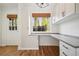 Bright office with built-in storage and countertops and hardwood flooring at 2232 Dunseath Nw Ave # 303, Atlanta, GA 30318