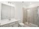 Bathroom featuring vanity, toilet, and tiled shower at 3887 Allegretto Cir # 114, Atlanta, GA 30339