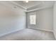 Well-lit bedroom with plush carpeting, a tray ceiling and neutral walls that bring in natural light at 4041 Andover Cir, Mcdonough, GA 30252