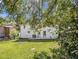 Expansive backyard features a well-manicured lawn, a patio area, and a freshly painted exterior at 580 Hutchens Se Rd, Atlanta, GA 30354